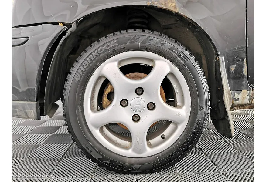 Nissan Micra 1.0 MT (60 л.с.) Черный в АВИЛОН. Слайд №9