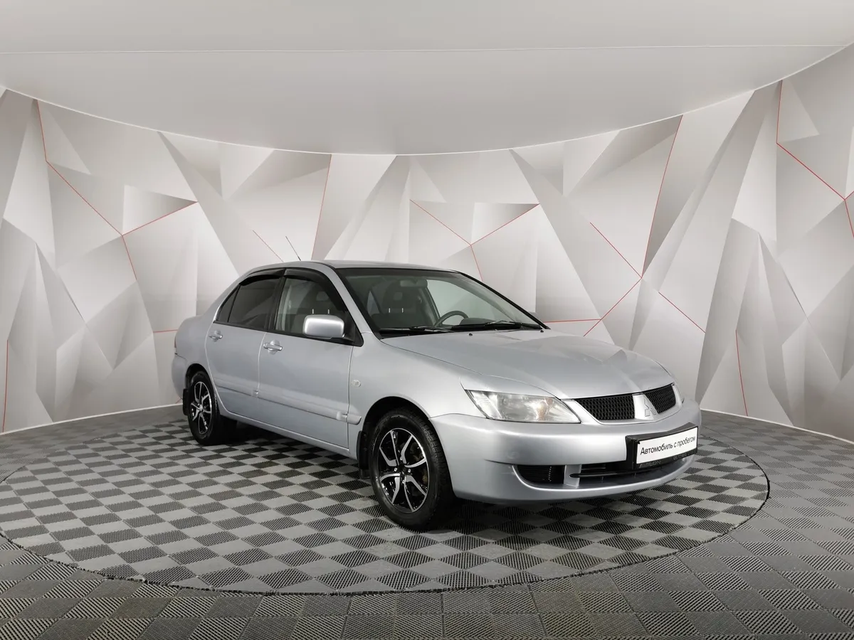 Mitsubishi Lancer 1.6 MT (98 л.с.) Серый в АВИЛОН. Слайд №3