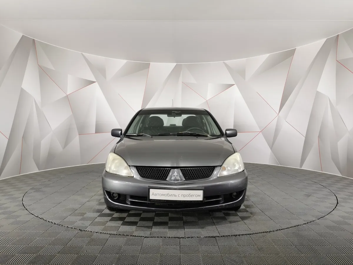 Mitsubishi Lancer 1.6 AT (98 л.с.) Серый в АВИЛОН. Слайд №7