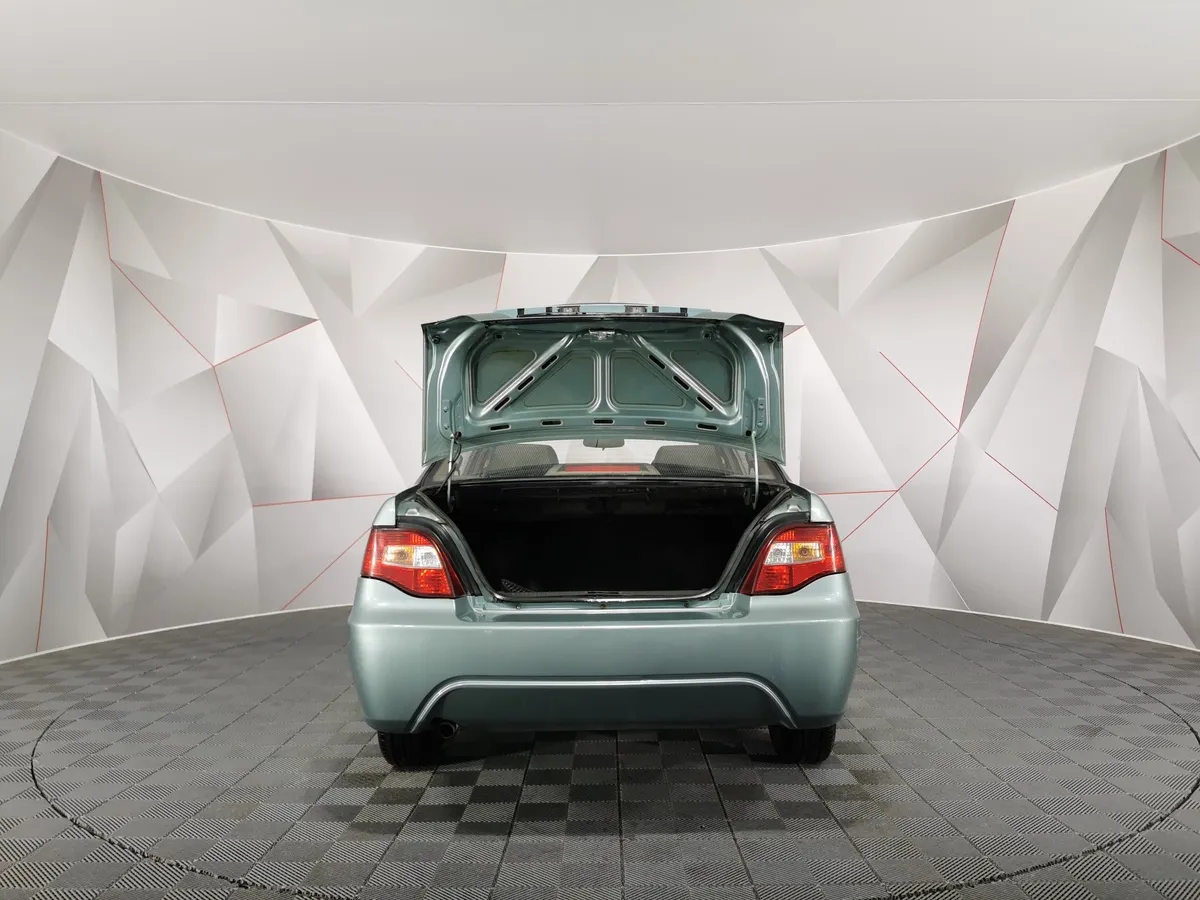 Daewoo Nexia 1.6 MT (109 л.с.) Зеленый в АВИЛОН. Слайд №11