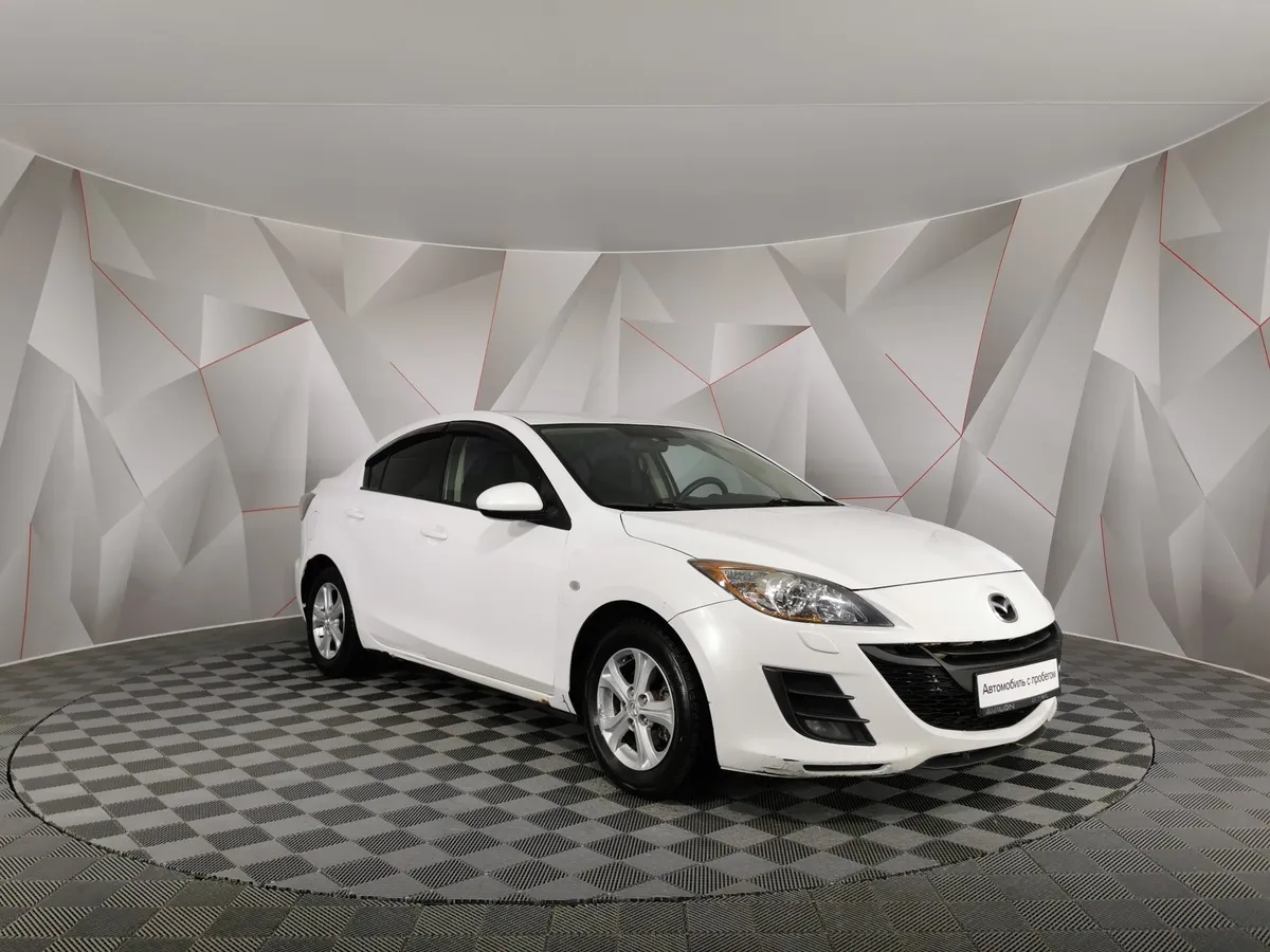 Mazda 3 1.6 AT (105 л.с.) Белый в АВИЛОН. Слайд №3