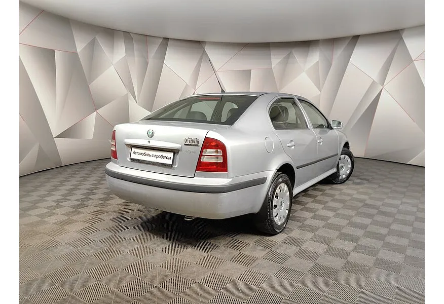 Skoda Octavia 1.4 MT (75 л.с.) Серебристый в АВИЛОН. Слайд №2