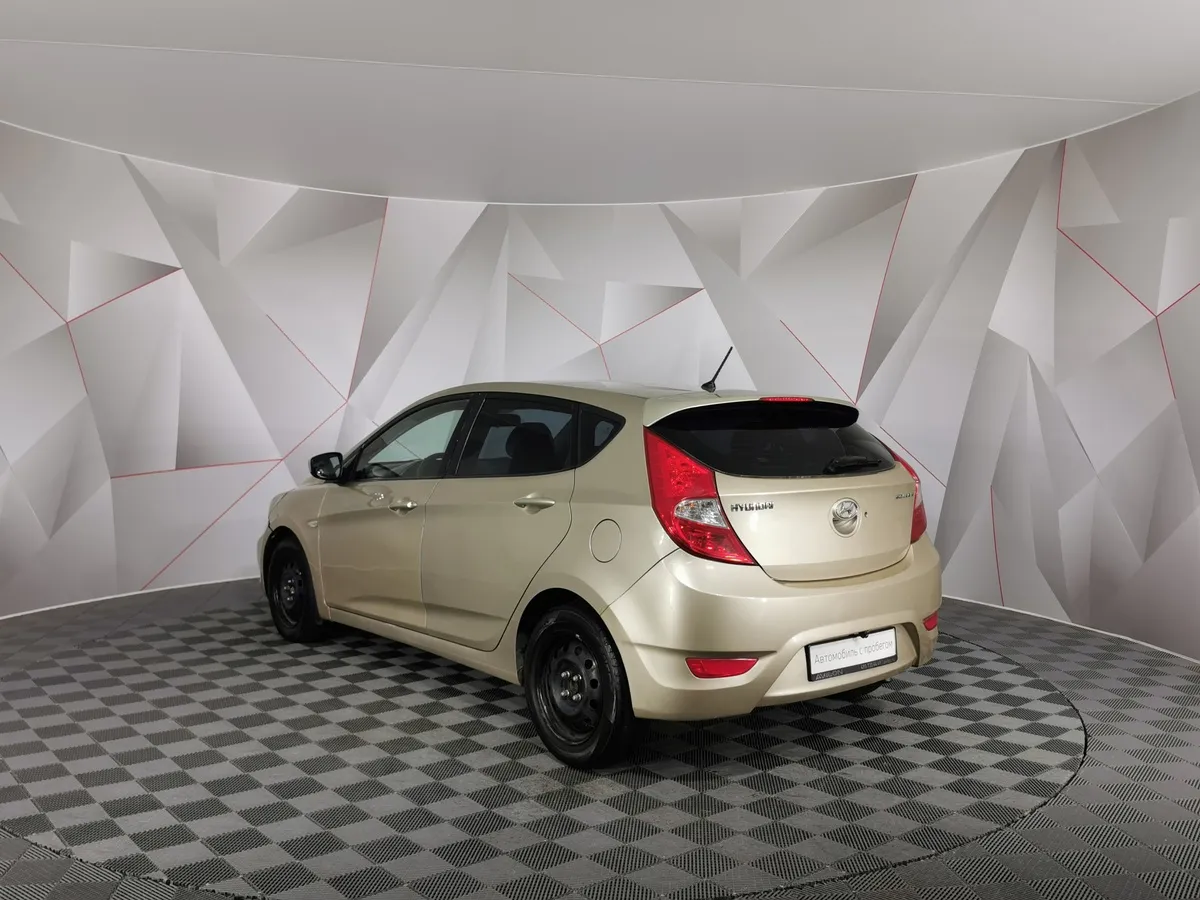 Hyundai Solaris 1.4 AT (107 л.с.) Active Бежевый в АВИЛОН. Слайд №4