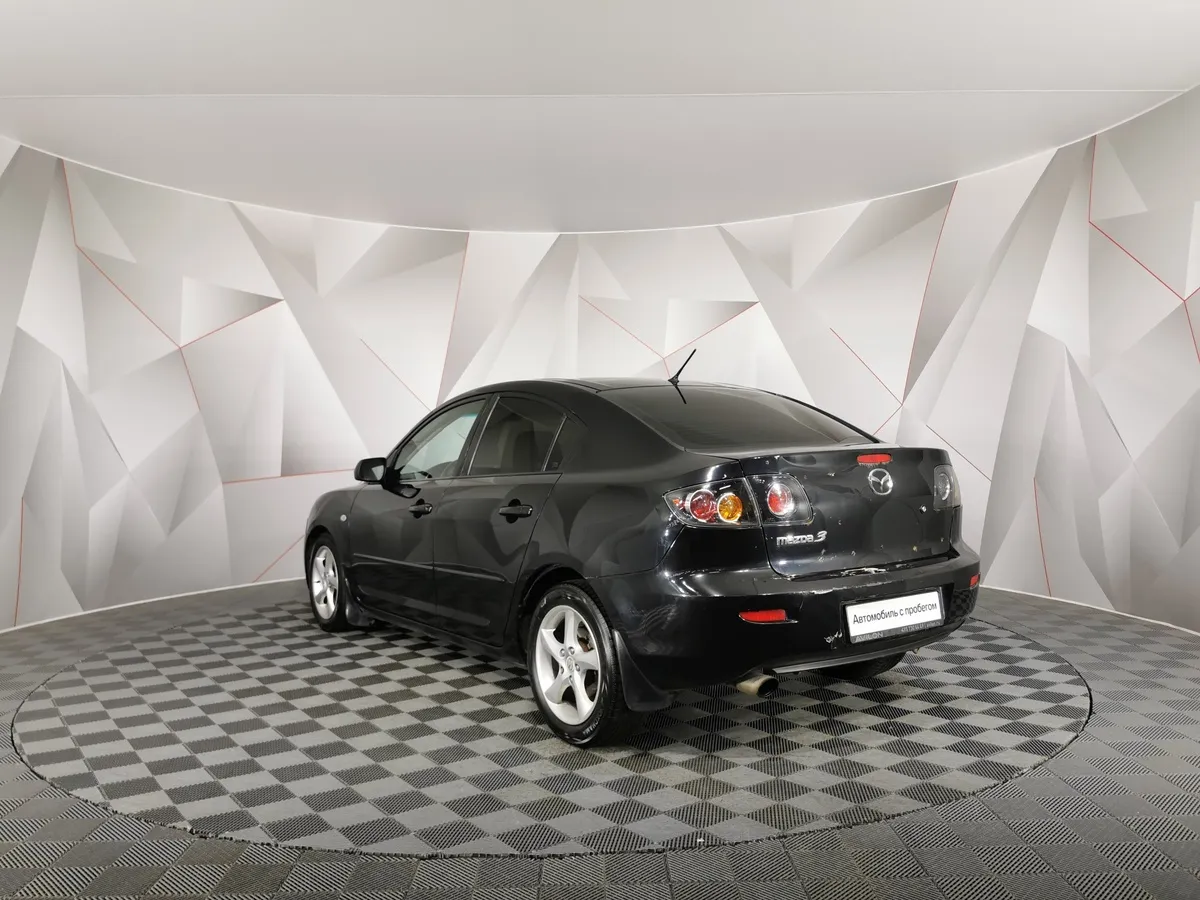 Mazda 3 1.6 MT (105 л.с.) Черный в АВИЛОН. Слайд №4
