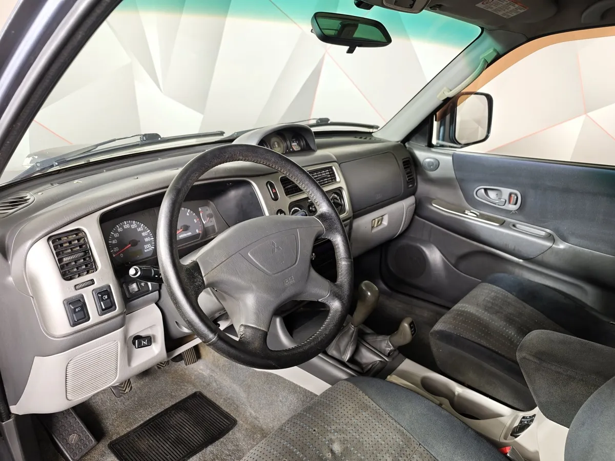 Mitsubishi Pajero Sport 2.5 TD MT 4WD (115 л.с.) Серый в АВИЛОН. Слайд №16