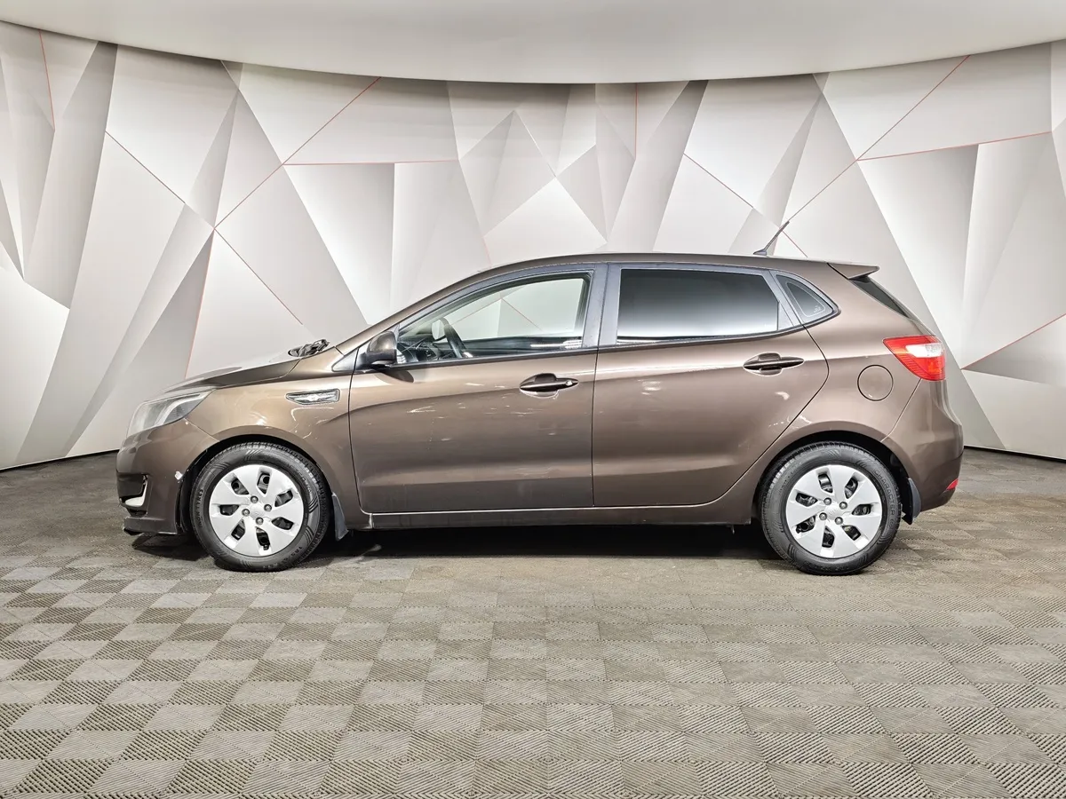 Kia Rio 1.6 AT (123 л.с.) Коричневый в АВИЛОН. Слайд №5