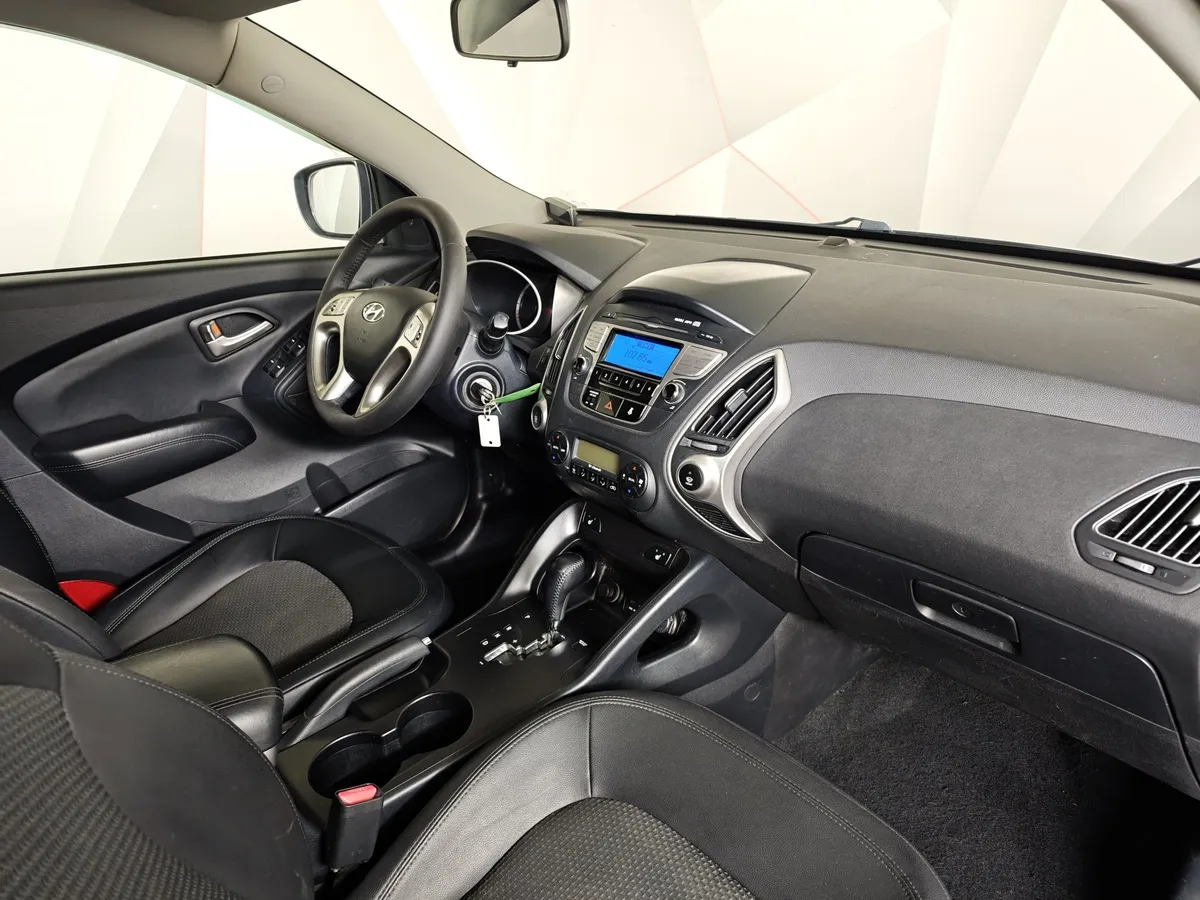 Hyundai ix35 2.0 AT 4WD (150 л.с.) Comfort Черный в АВИЛОН. Слайд №13