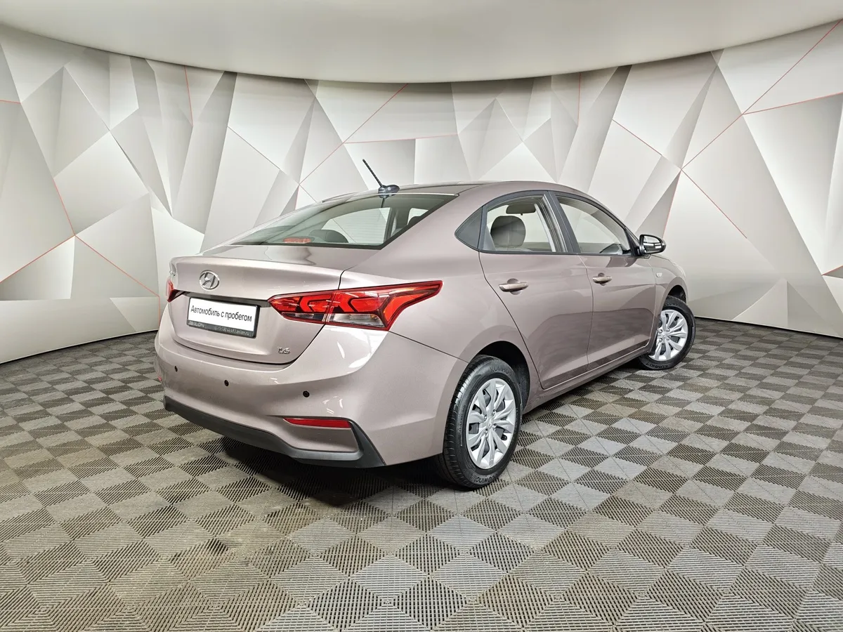 Hyundai Solaris 1.6 AT (123 л.с.) Comfort Коричневый в АВИЛОН. Слайд №2