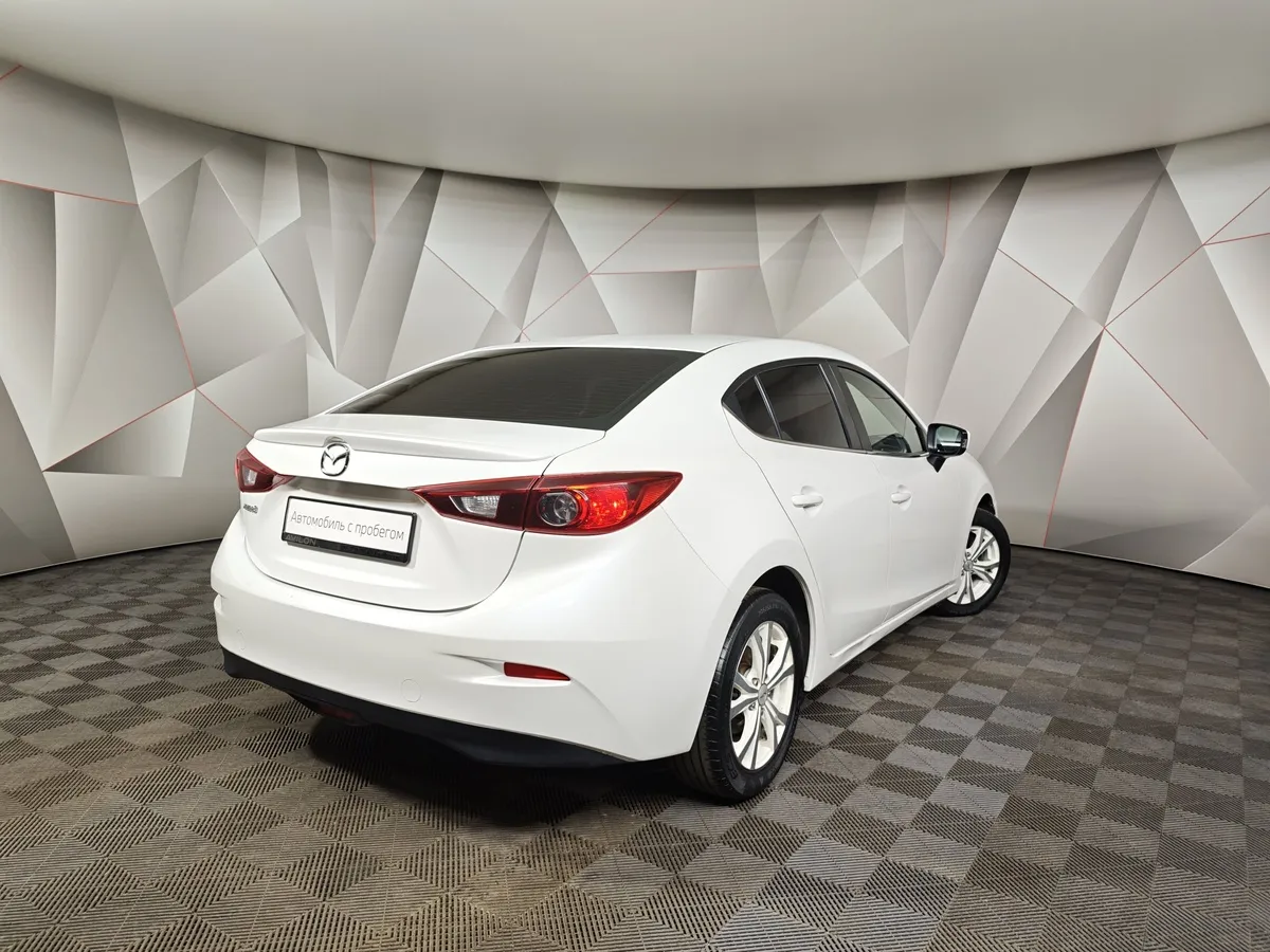Mazda 3 1.6 MT (104 л.с.) Белый в АВИЛОН. Слайд №2