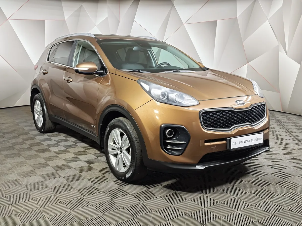 Kia Sportage 2.0 MPI AT 4WD (150 л.с.) Comfort Коричневый в АВИЛОН. Слайд №3