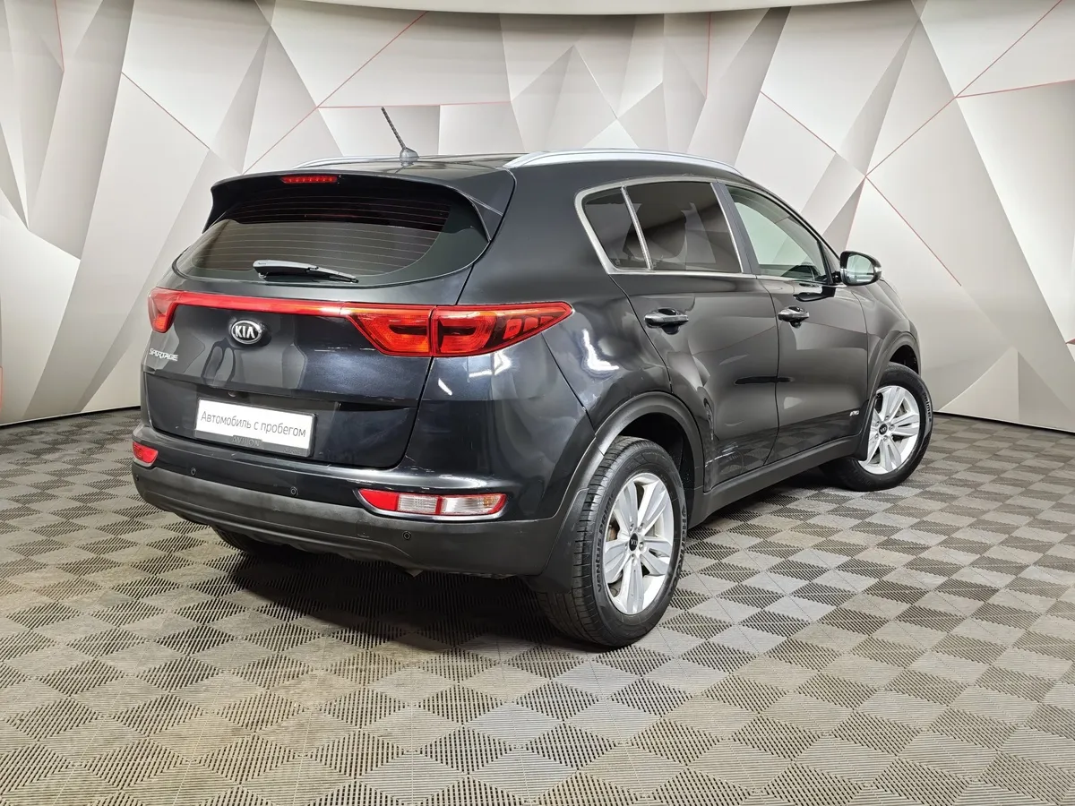 Kia Sportage 2.0 AT 4WD (150 л.с.) Comfort Черный в АВИЛОН. Слайд №2