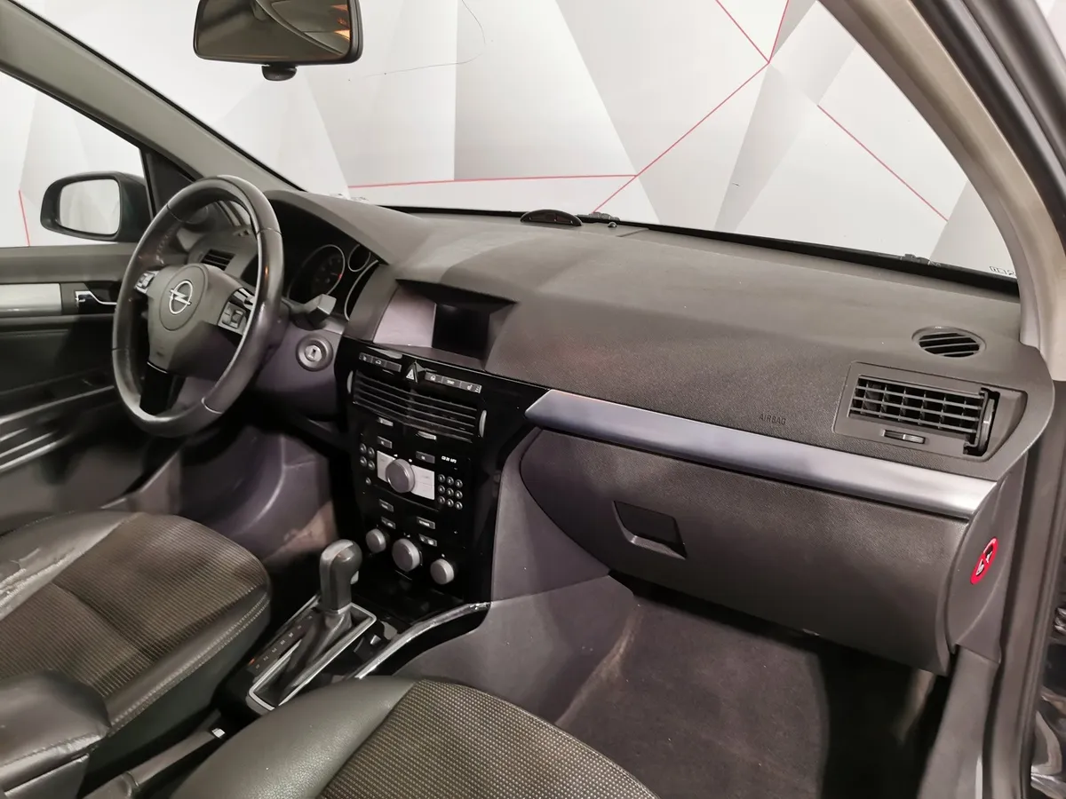 Opel Astra 1.8 AT (140 л.с.) base Черный в АВИЛОН. Слайд №12