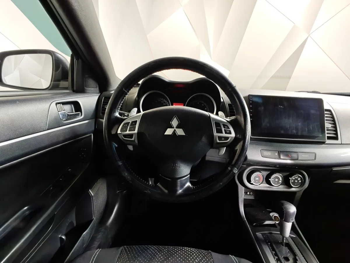 Mitsubishi Lancer 1.8 CVT (143 л.с.) Черный в АВИЛОН. Слайд №18