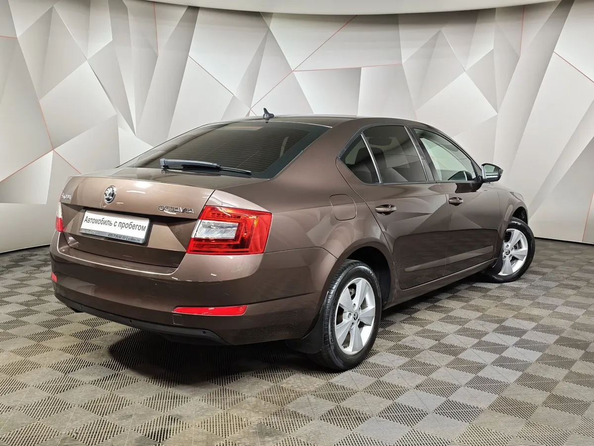 Skoda Octavia 1.6 MPI AT (110 л.с.) Коричневый в АВИЛОН. Слайд №2
