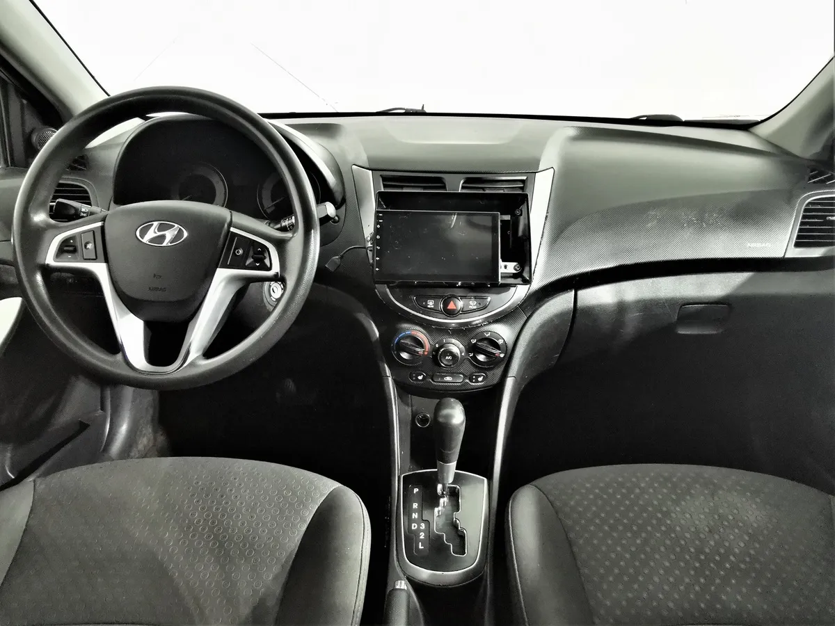 Hyundai Solaris 1.4 AT (107 л.с.) Active Бежевый в АВИЛОН. Слайд №13