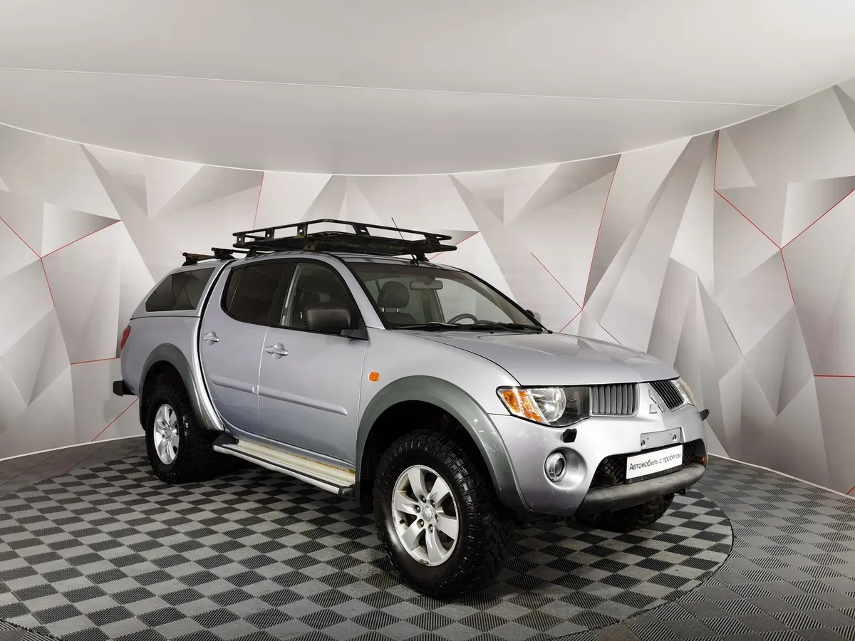 Mitsubishi L200 2.4 DID AT AWD (154 л.с.) DC Intense Серебристый в АВИЛОН. Слайд №3