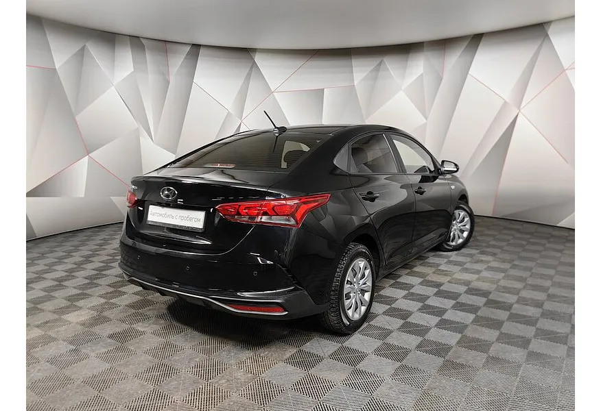 Hyundai Solaris 1.6 AT (123 л.с.) Comfort Черный в АВИЛОН. Слайд №2