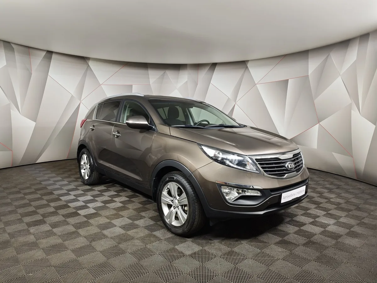 Kia Sportage 2.0 AT (150 л.с.) Коричневый в АВИЛОН. Слайд №3