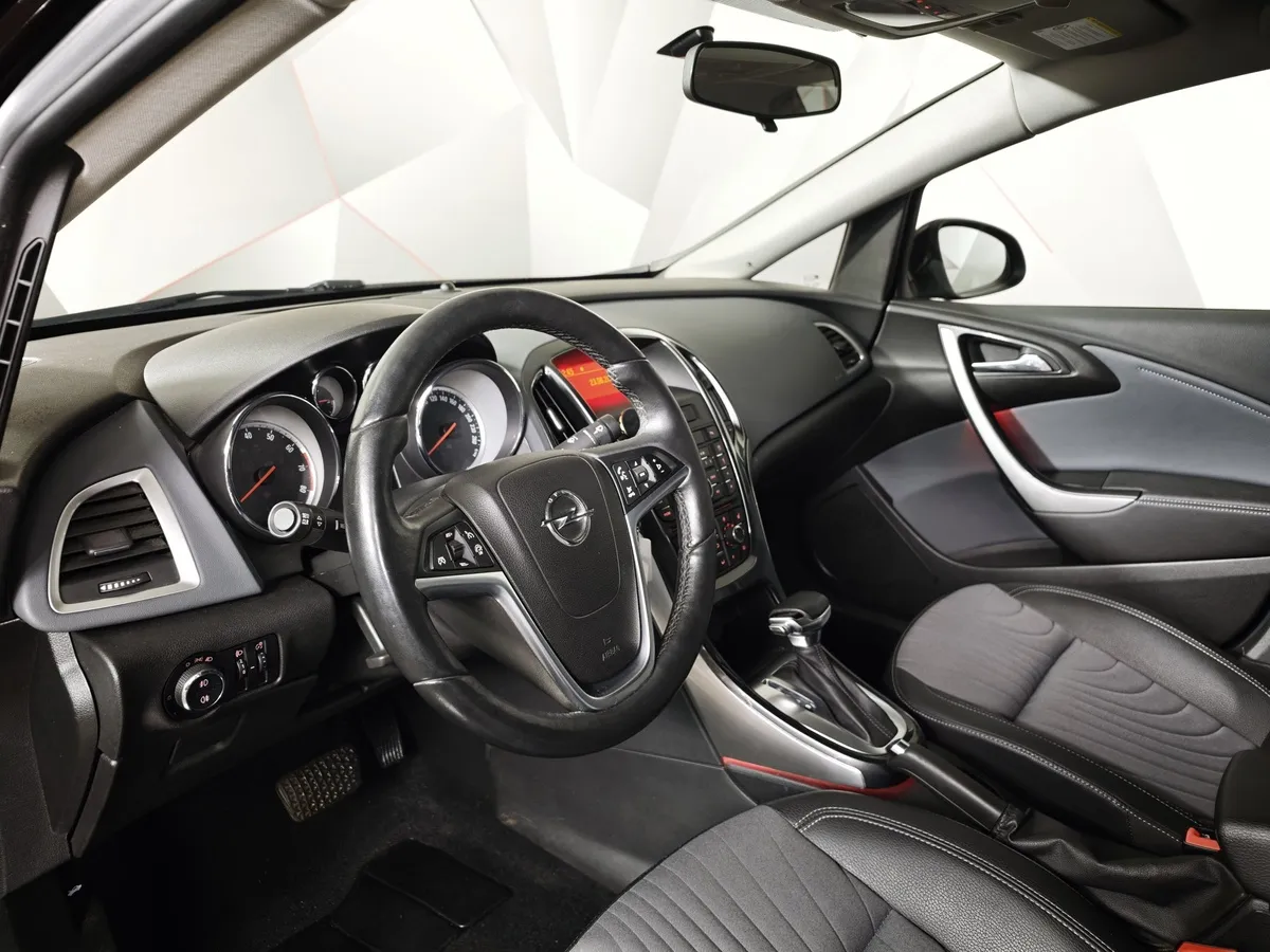 Opel Astra 1.4 Turbo AT (140 л.с.) Коричневый в АВИЛОН. Слайд №18