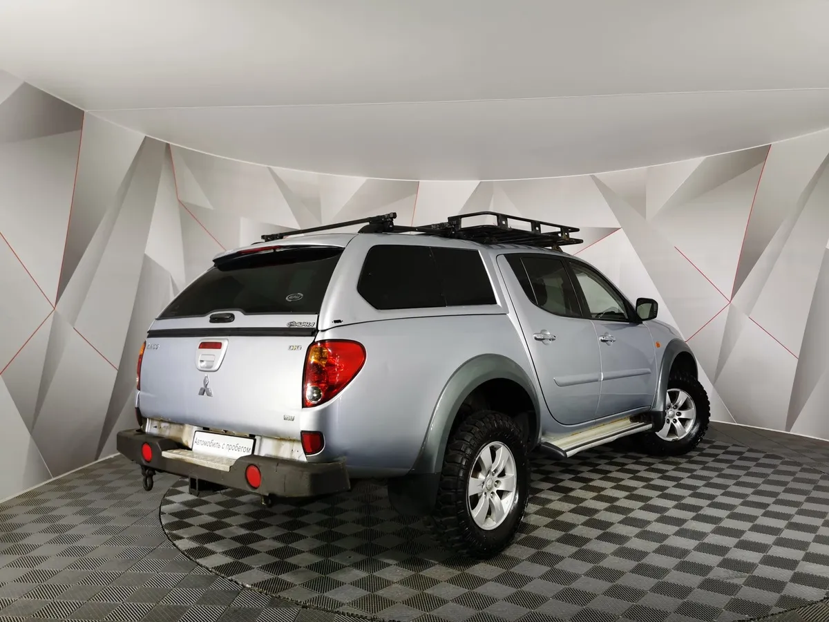 Mitsubishi L200 2.4 DID AT AWD (154 л.с.) DC Intense Серебристый в АВИЛОН. Слайд №2