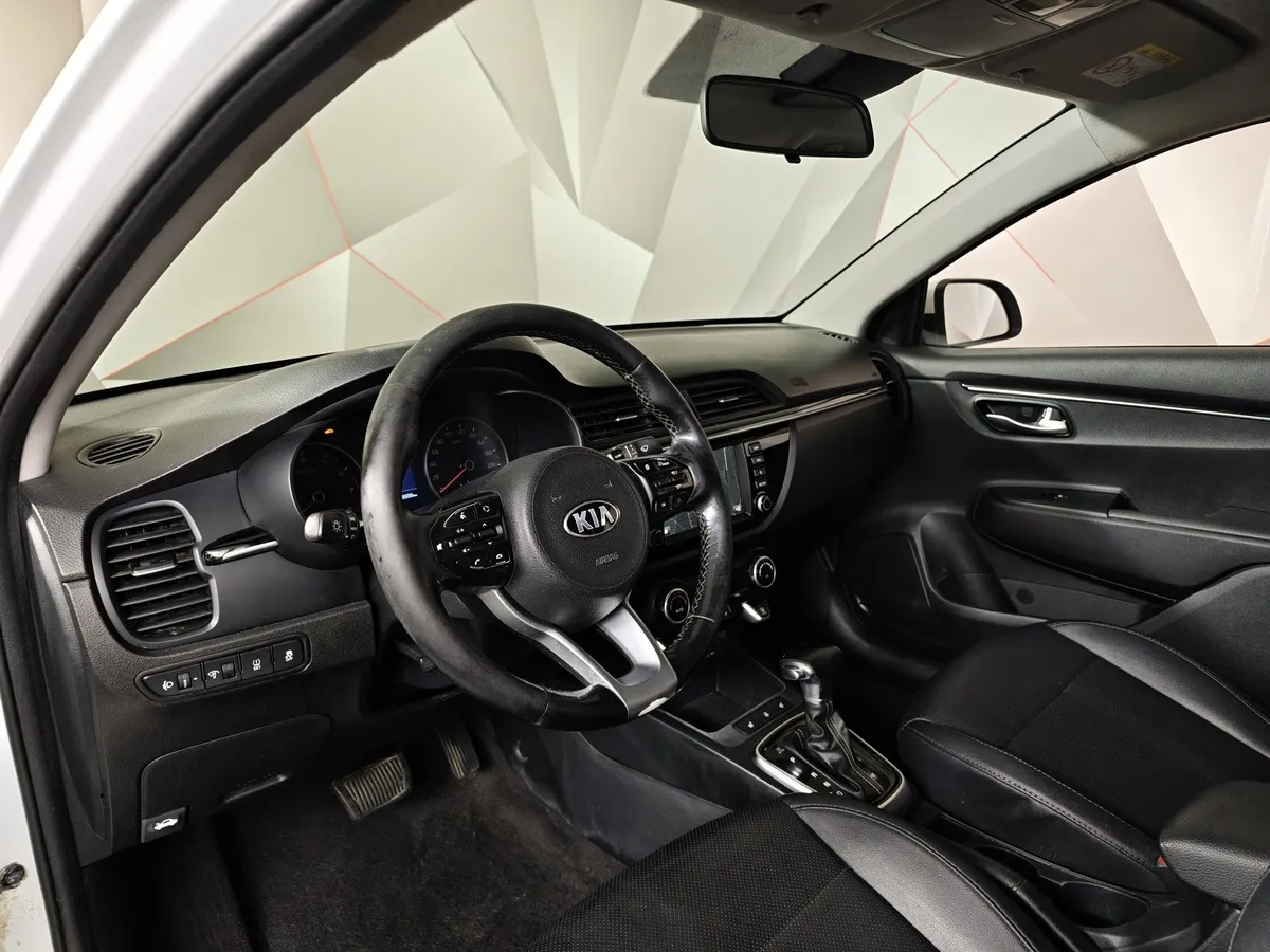 Kia Rio 1.6 AT (123 л.с.) Белый в АВИЛОН. Слайд №19