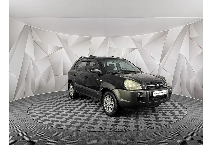 Hyundai Tucson 2.7 AT 4WD (175 л.с.) Черный в АВИЛОН. Слайд №3