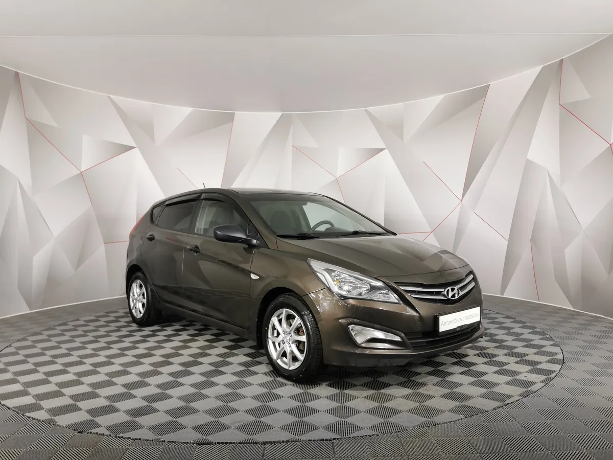 Hyundai Solaris 1.4 MT (107 л.с.) Active Коричневый в АВИЛОН. Слайд №3