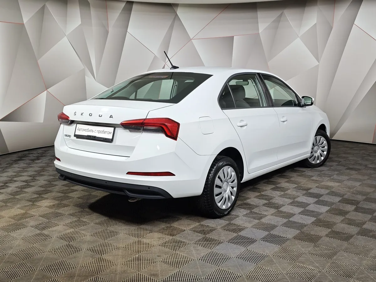 Skoda Rapid 1.6 AT (110 л.с.) Белый в АВИЛОН. Слайд №2