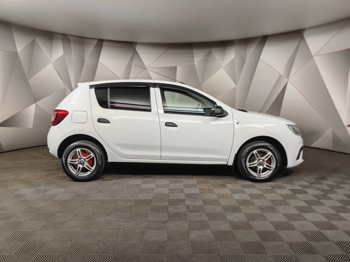 Renault Sandero 1.6 MT (82 л.с.) Confort Белый в АВИЛОН. Слайд №6