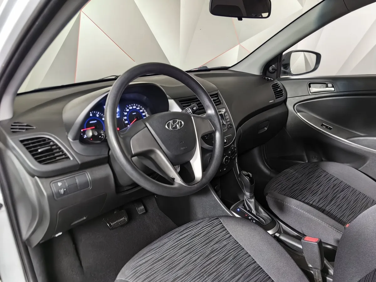 Hyundai Solaris 1.6 AT (123 л.с.) Белый в АВИЛОН. Слайд №19