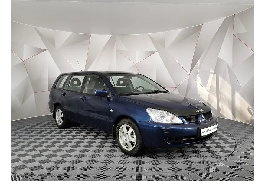 Mitsubishi Lancer 1.6 MT (100 л.с.) Синий в АВИЛОН. Слайд №2