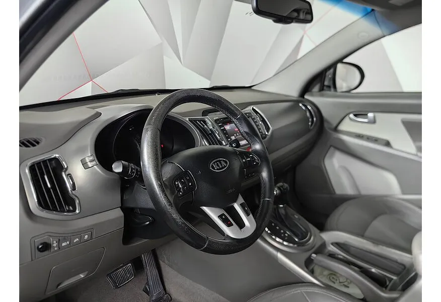 Kia Sportage 2.0 TD AT 4WD (136 л.с.) Бежевый в АВИЛОН. Слайд №19