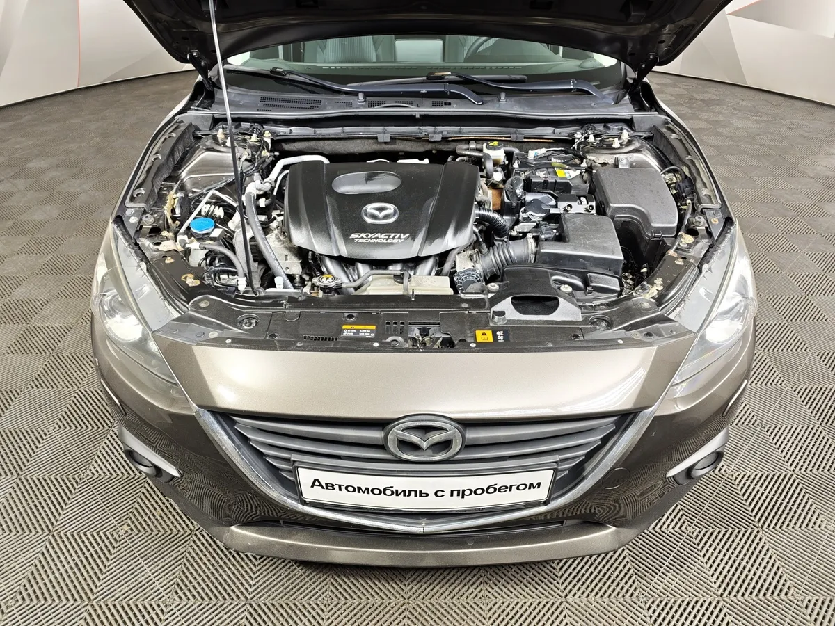 Mazda 3 1.6 AT (104 л.с.) Коричневый в АВИЛОН. Слайд №11