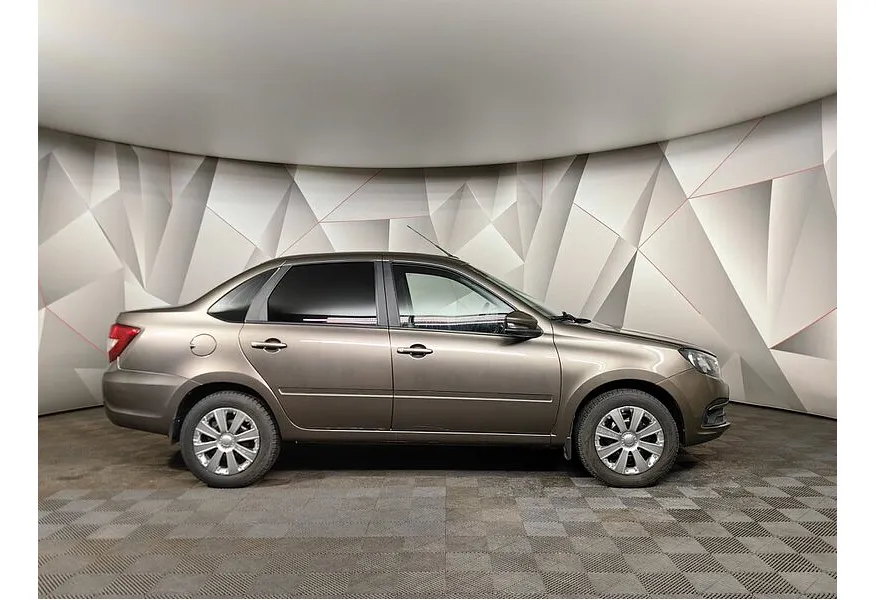 ВАЗ (Lada) Granta 1.6 MT 16 кл (106 л.с.) Коричневый в АВИЛОН. Слайд №6
