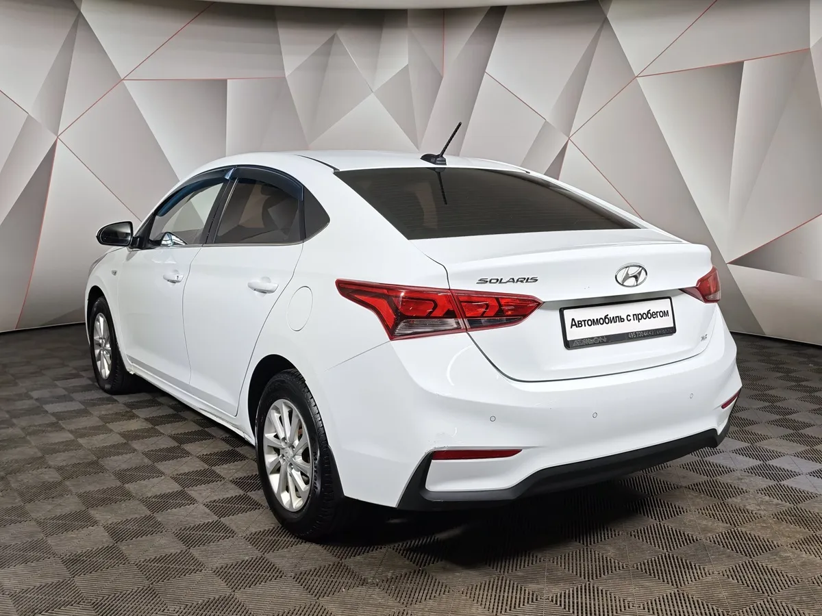 Hyundai Solaris 1.6 MT (123 л.с.) Elegance Белый в АВИЛОН. Слайд №4