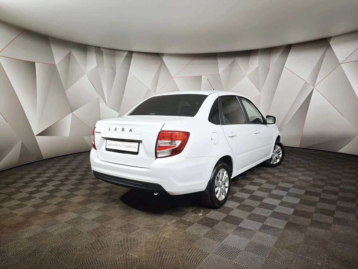 ВАЗ (Lada) Granta 1.6 MT 8кл (87 л.с.) Белый в АВИЛОН. Слайд №2