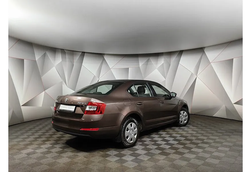 Skoda Octavia 1.6 MPI MT (110 л.с.) Коричневый в АВИЛОН. Слайд №2