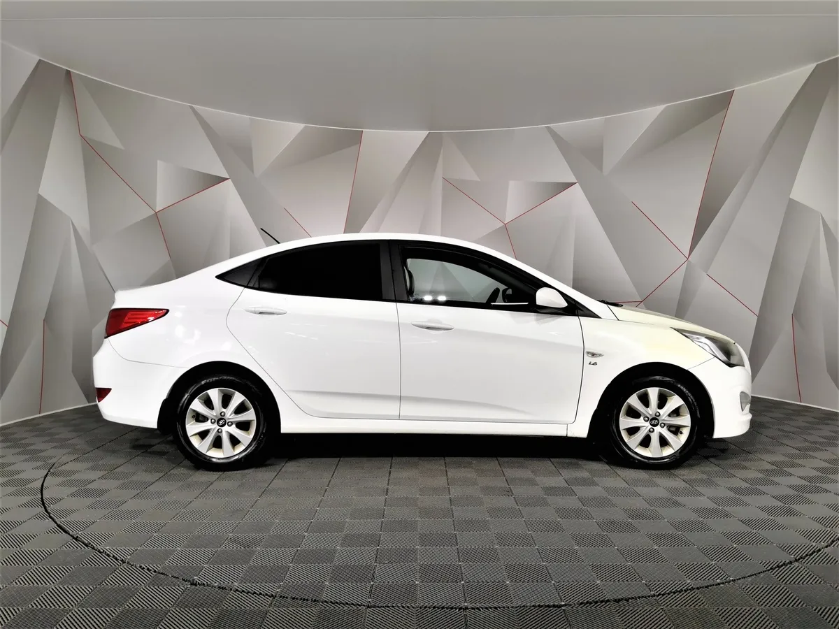 Hyundai Solaris 1.6 AT (123 л.с.) Optima Белый в АВИЛОН. Слайд №6
