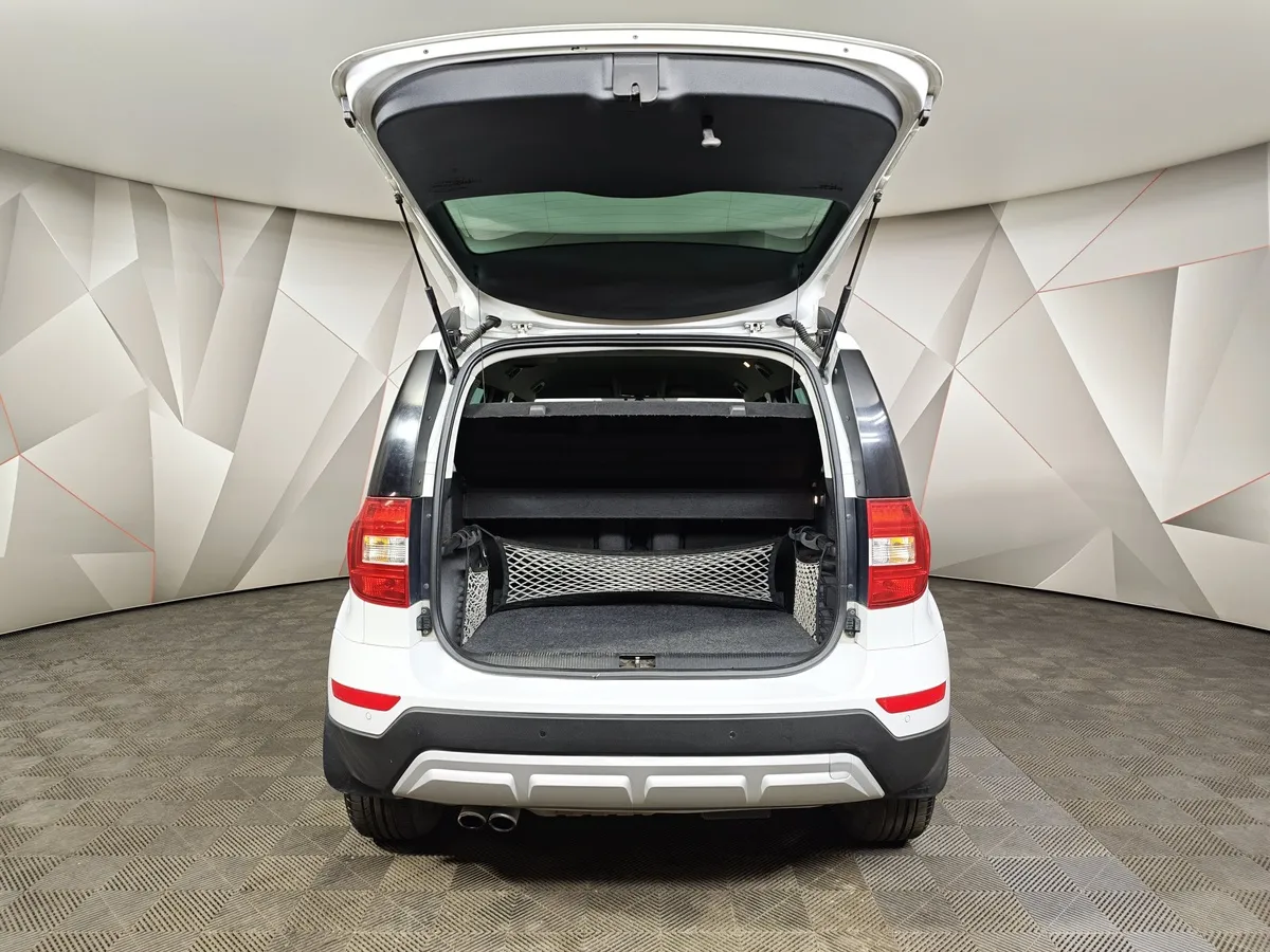 Skoda Yeti 1.8 TSI 4x4 DSG (152 л.с.) Белый в АВИЛОН. Слайд №11
