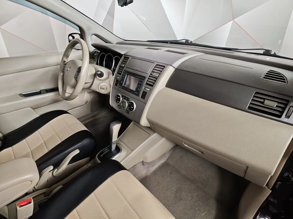 Nissan Tiida 1.6 AT (110 л.с.) Черный в АВИЛОН. Слайд №12