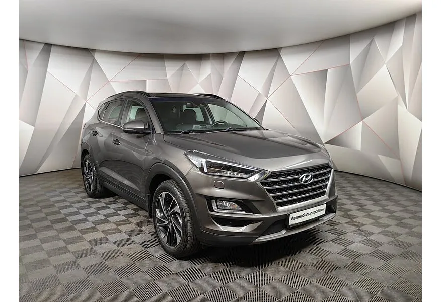 Hyundai Tucson 2.0 CRDi AT 4WD (185 л.с.) High-Tech Коричневый в АВИЛОН. Слайд №3