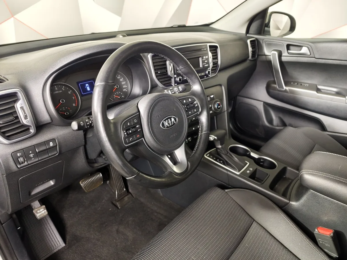 Kia Sportage 2.0 AT (150 л.с.) Comfort Белый в АВИЛОН. Слайд №19