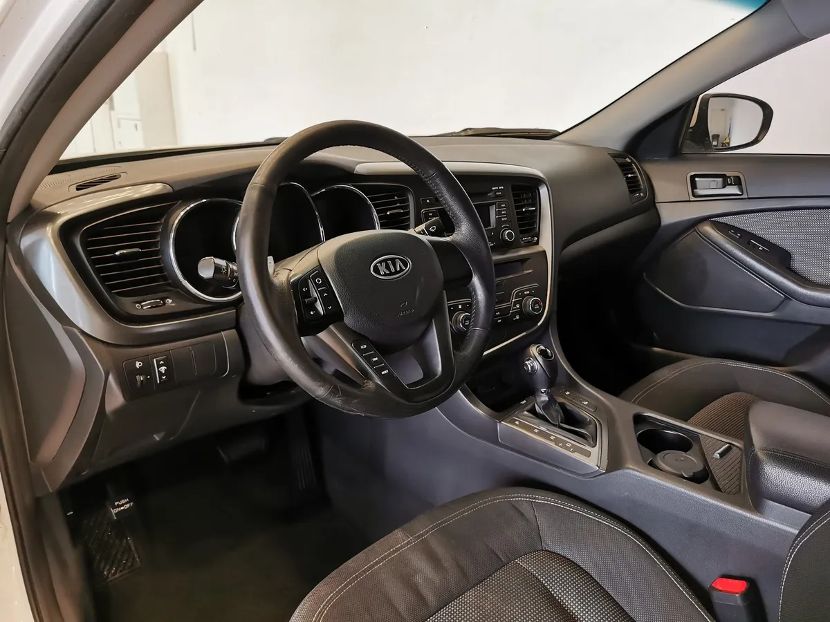 Kia Optima 2.0 AT (150 л.с.) Comfort Белый в АВИЛОН. Слайд №18