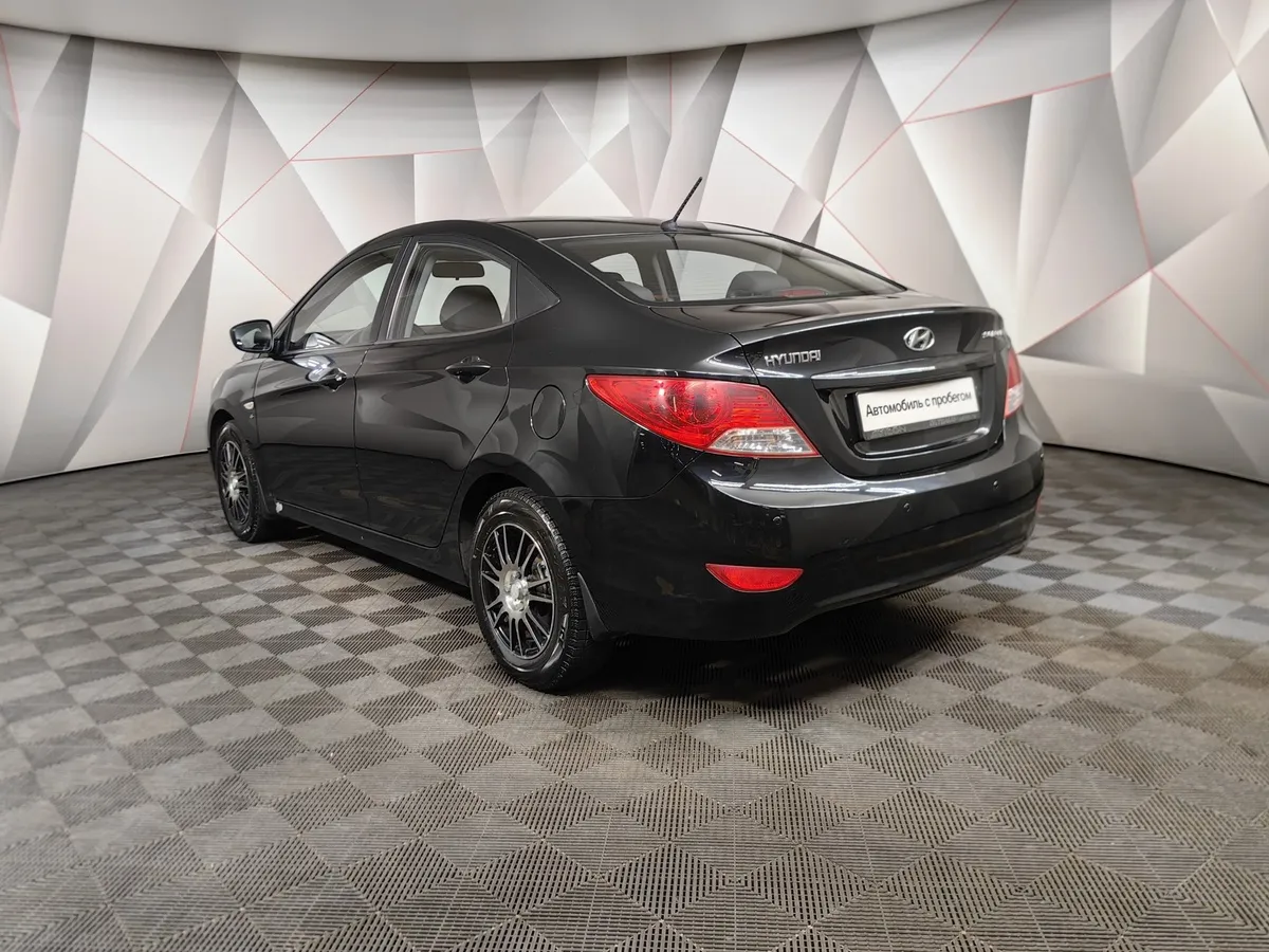 Hyundai Solaris 1.6 MT (123 л.с.) Optima Черный в АВИЛОН. Слайд №4