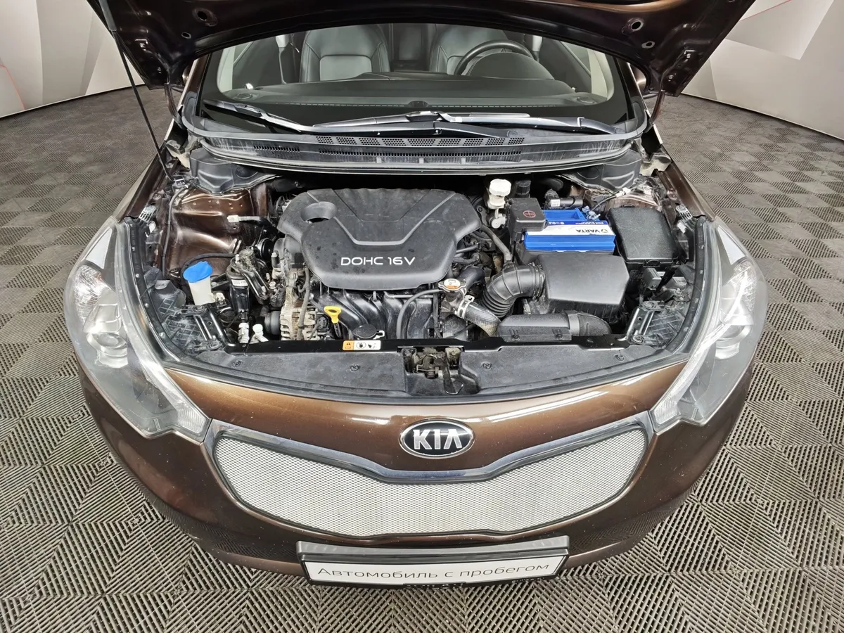 Kia Cerato 1.6 AT (130 л.с.) Коричневый в АВИЛОН. Слайд №11