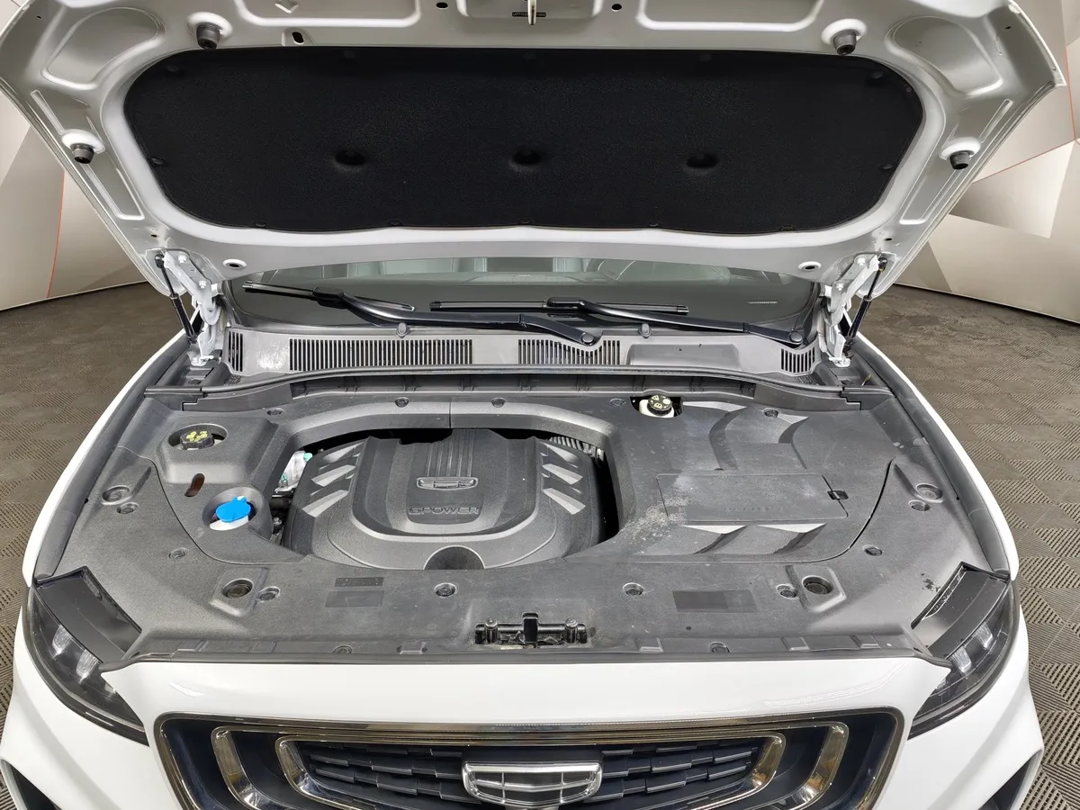 Geely Atlas Pro 1.5T 7DCT AWD (177 л.с.) Flagship Белый в АВИЛОН. Слайд №11