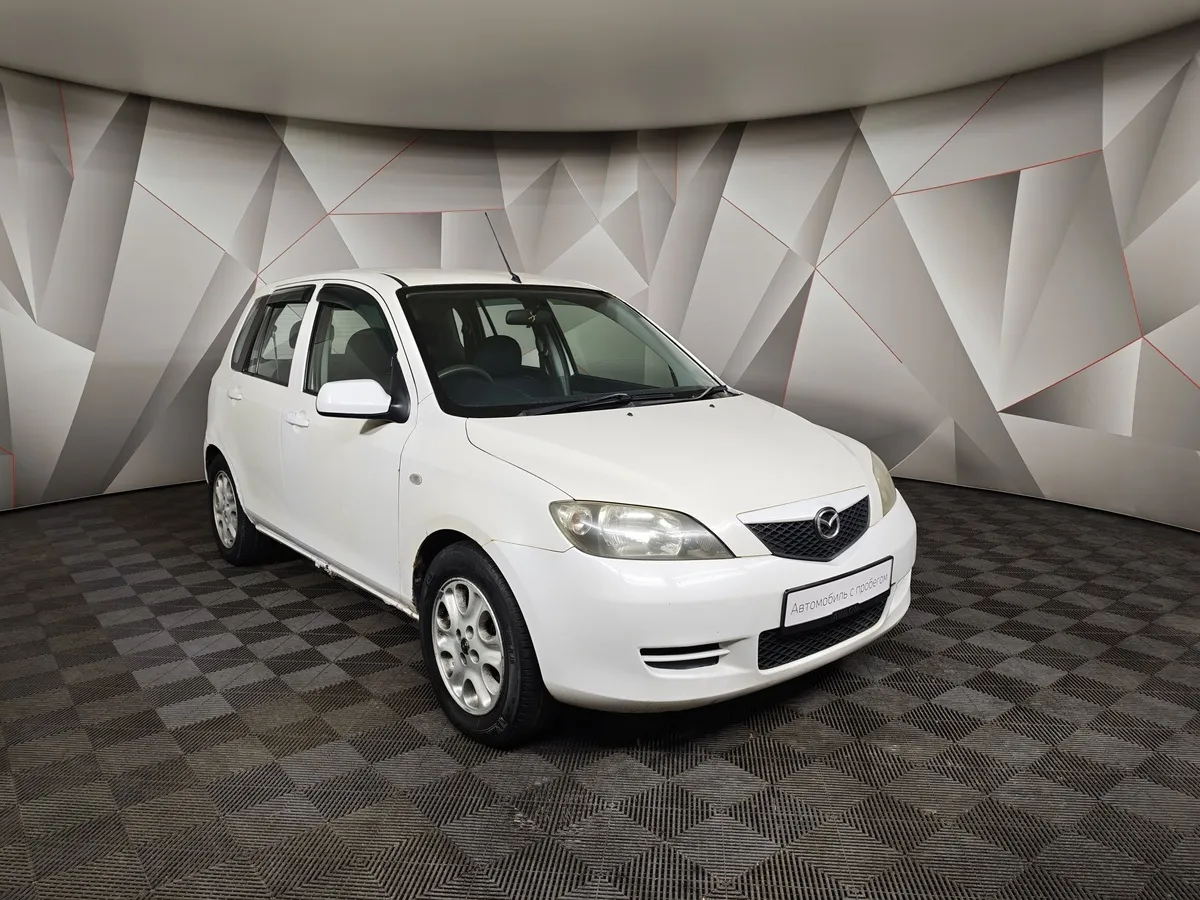 Mazda Demio 1.5 AT (100 л.с.) Белый в АВИЛОН. Слайд №3