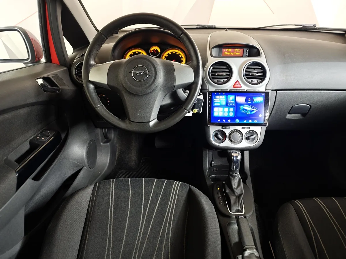 Opel Corsa 1.4 MT (90 л.с.) Красный в АВИЛОН. Слайд №16
