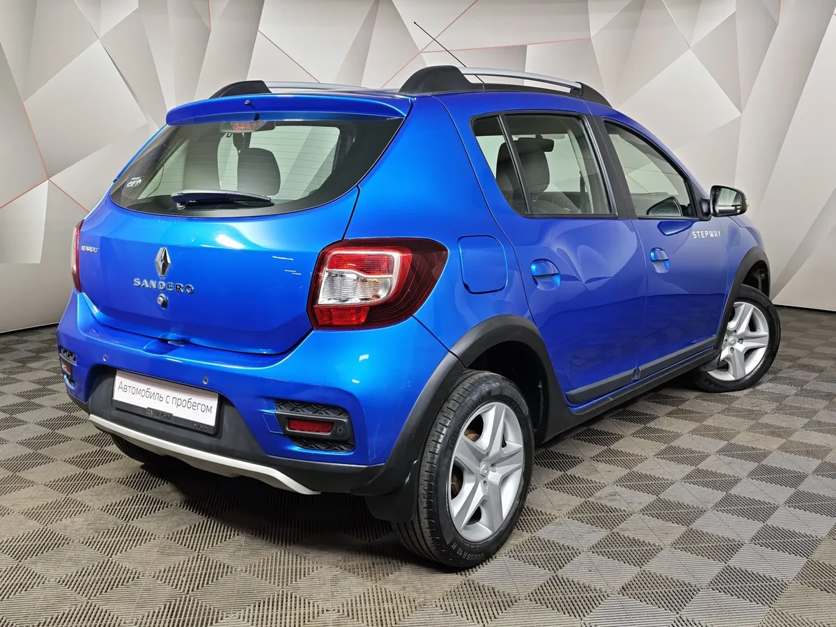 Renault Sandero 1.6 MT (113 л.с.) Stepway Drive Синий в АВИЛОН. Слайд №2