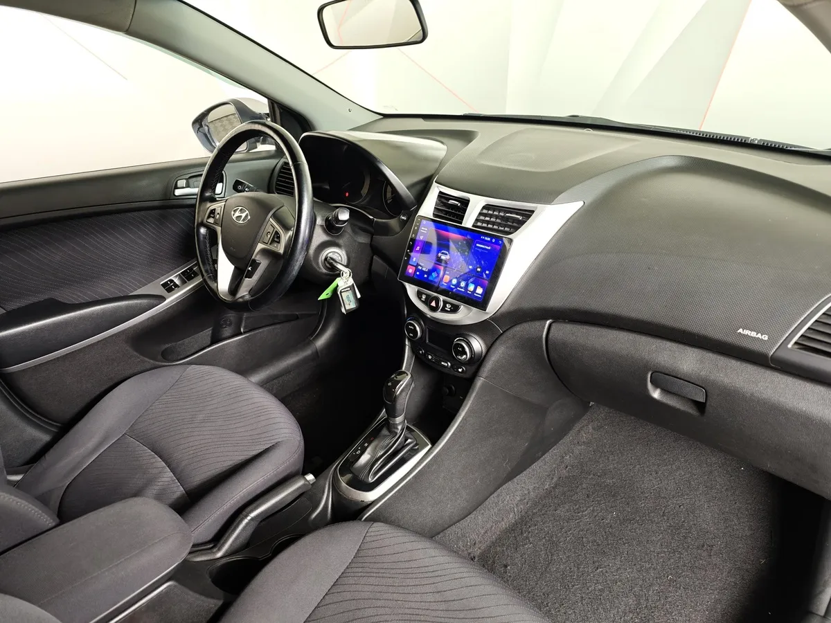 Hyundai Solaris 1.6 AT (123 л.с.) Elegance Серый в АВИЛОН. Слайд №13